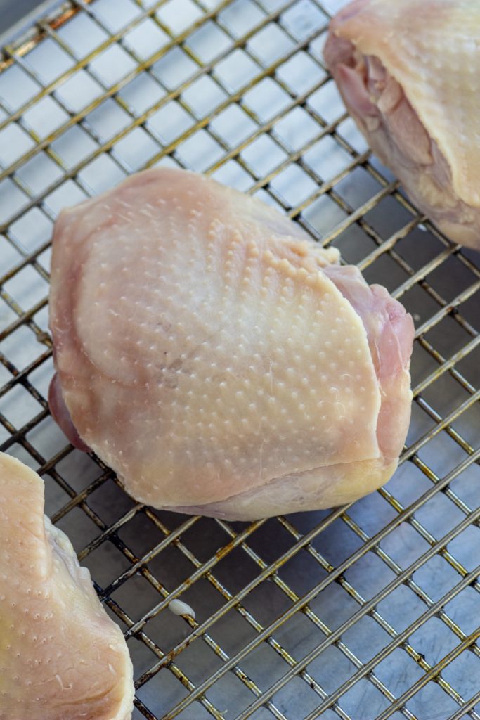 raw chicken treated with boiling water